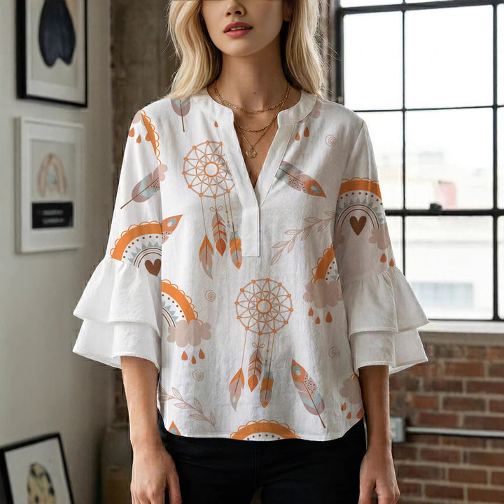 Damen Bluse mit voluminösen Flügelärmel und intensivem Blattmuster Echo Archiv