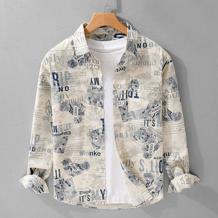 Herren Overshirt aus Baumwoll‑Leinen mit typografischem Zeitungsprint und Relaxed‑Fit Echoarchiv