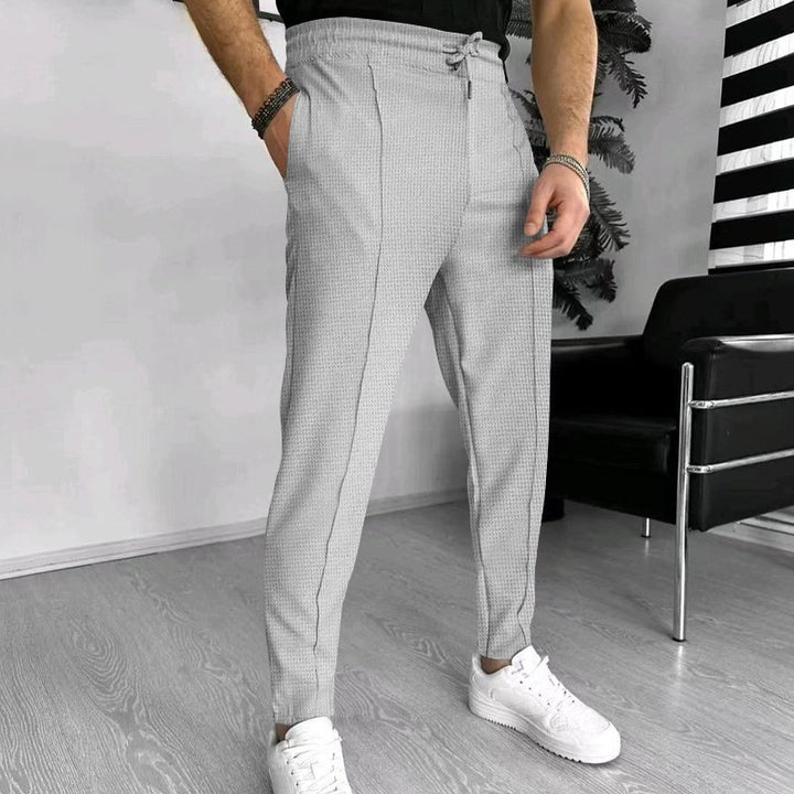 Herren modische Freizeithose mit elastischem Bund und eingewebtem Muster Echoarchiv