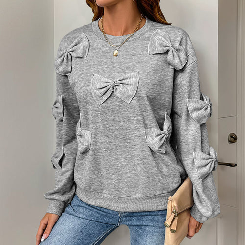Damen Kuschel-Sweatshirt mit 3D-Schleifenapplikationen, Rundhals & Rippbündchen Echoarchiv