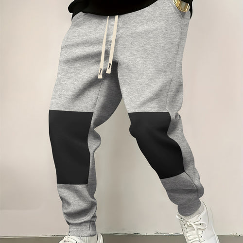 Herren elegante Sporthose mit modernen Farbblockelementen Echoarchiv