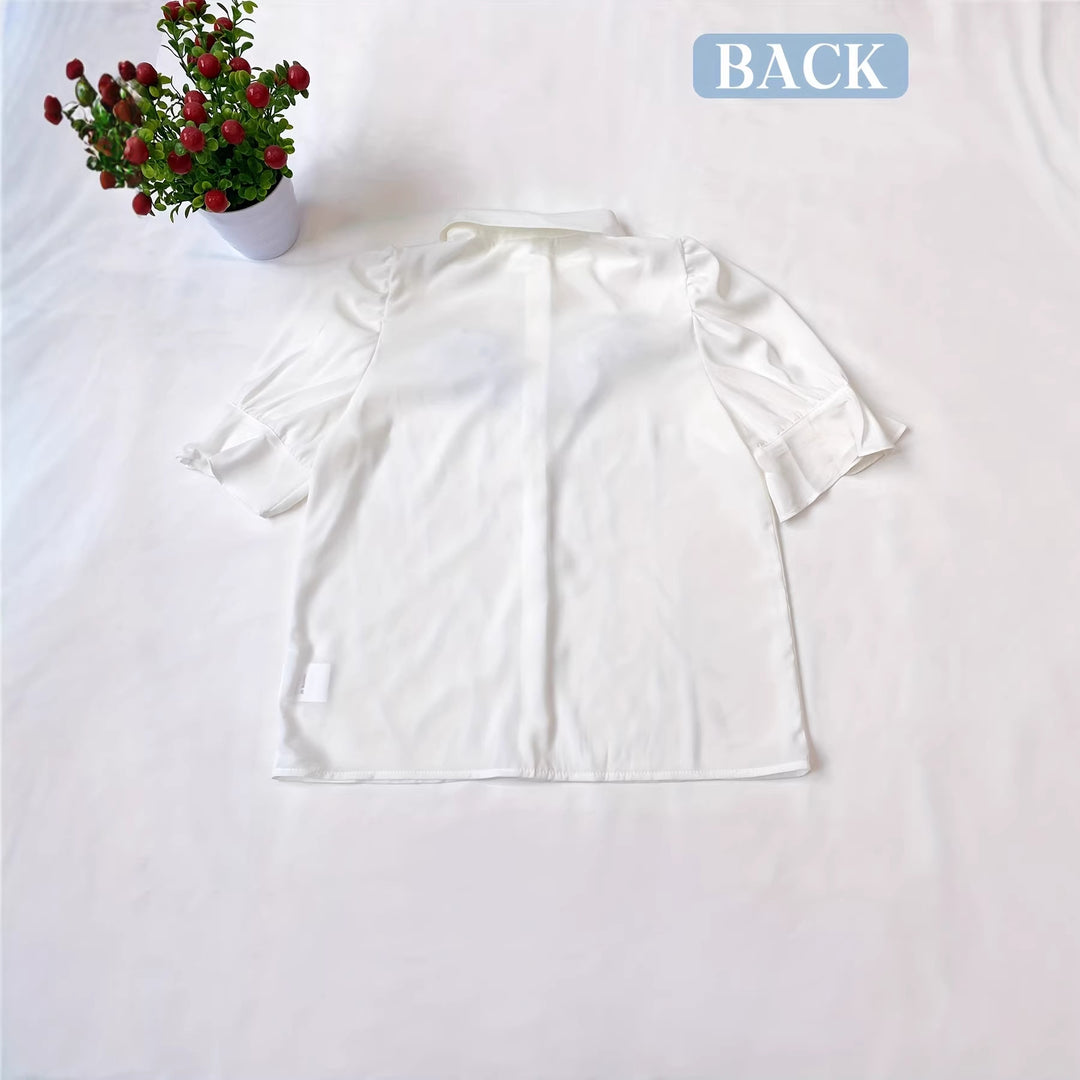 Damen Modische Bluse mit Rüschendetails und Puffärmeln Echo Archiv
