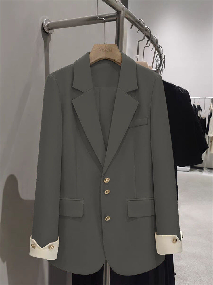 Damen Eleganter Blazer mit goldenen Knopfdetails Echo Archiv