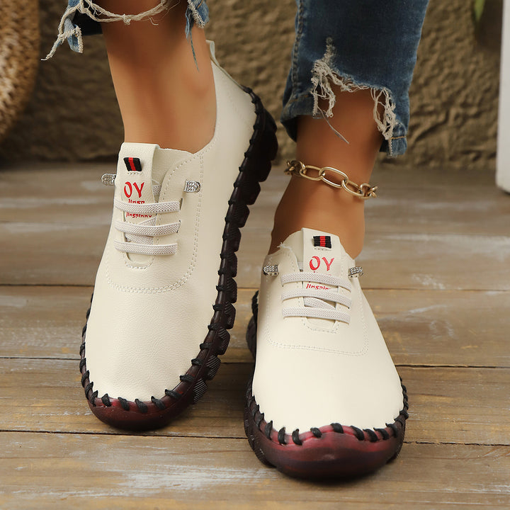 Damen Bequeme Lederoptik-Slipper mit flexibler Profilsohle und Mokassin-Naht – Lioré