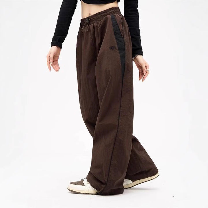 Damen nan weite Trackhose mit Kontrastpaspel, elastischem Bund und Oversize-Schnitt Echo Archiv