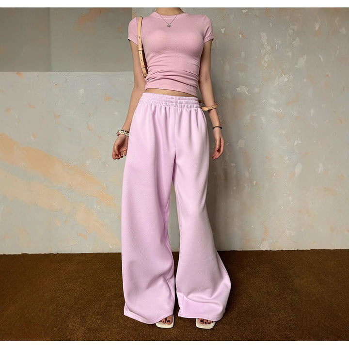 Damen weite Loungehose mit elastischem Bund, seitlichen Eingrifftaschen und fließendem Bein – Avélisse