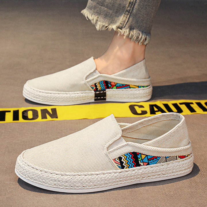 Damen Espadrille-Slipper aus Canvas mit geflochtener Jute-Sohle und farbigem Ethno-Detail Echoarchiv