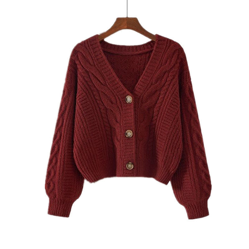 Damen Strickjacke mit ausgefallenem Zopfmuster und tiefem V-Ausschnitt Echoarchiv