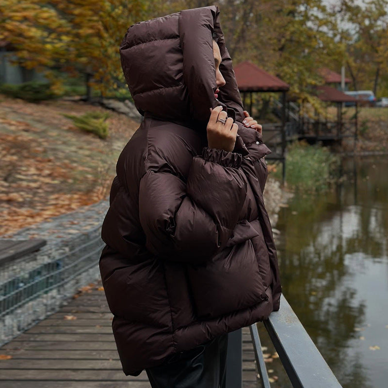 Echoarchiv | Damen Gesteppte Winterjacke mit Oversized Kapuze – Warm, Wasserabweisend & Modern