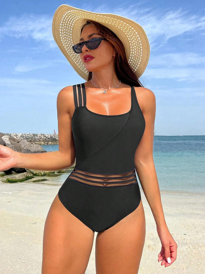 Damen Sportlicher Einteiler Badeanzug mit innovativem Schnitt Echo Archiv