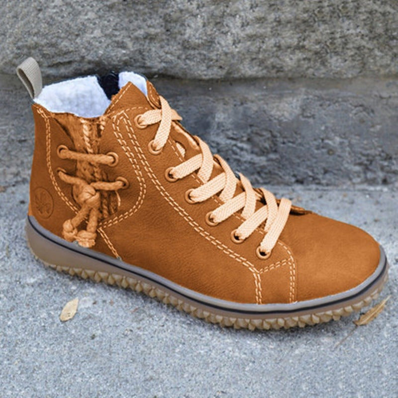 Damen High-Top Sneaker-Boot mit seitlichem Reißverschluss, dekorativem Knöchelriemen und profilierter Gummisohle Echo Archiv