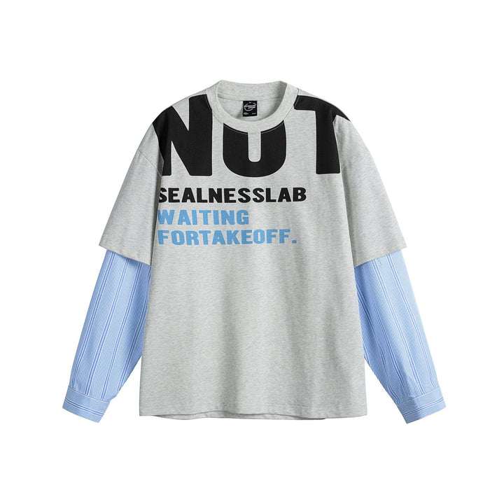Damen Lagenlook T-Shirt mit eingearbeiteten Hemdärmeln und oversized Print Echoarchiv