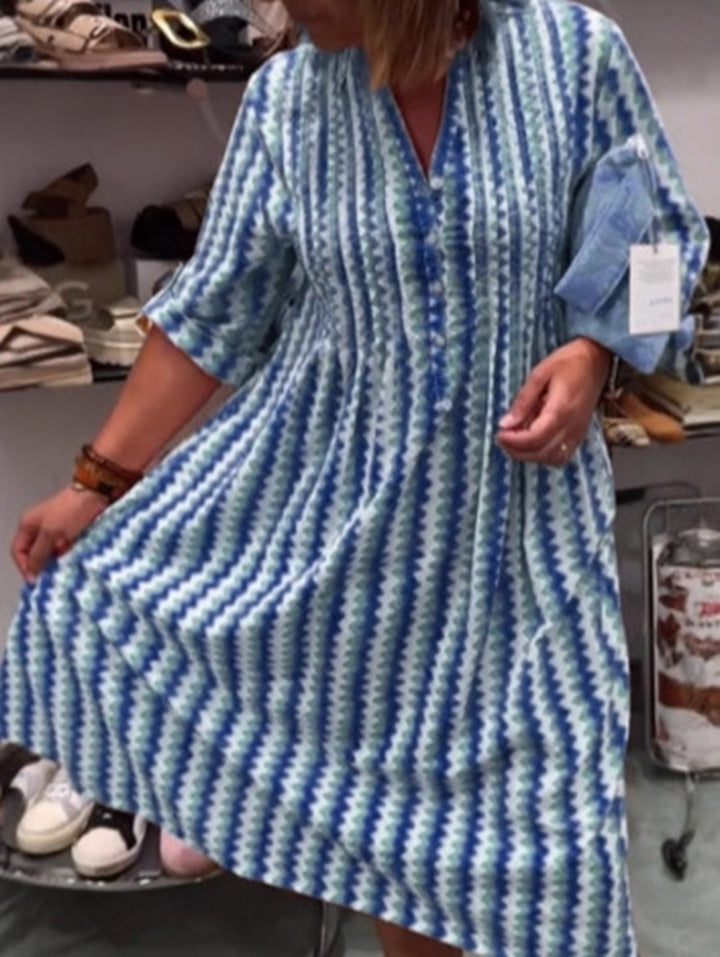 Damen nan Midikleid mit Unterbrustnaht, V-Ausschnitt, Knopfleiste und krempelbaren dreiviertelärmeln Echo Archiv
