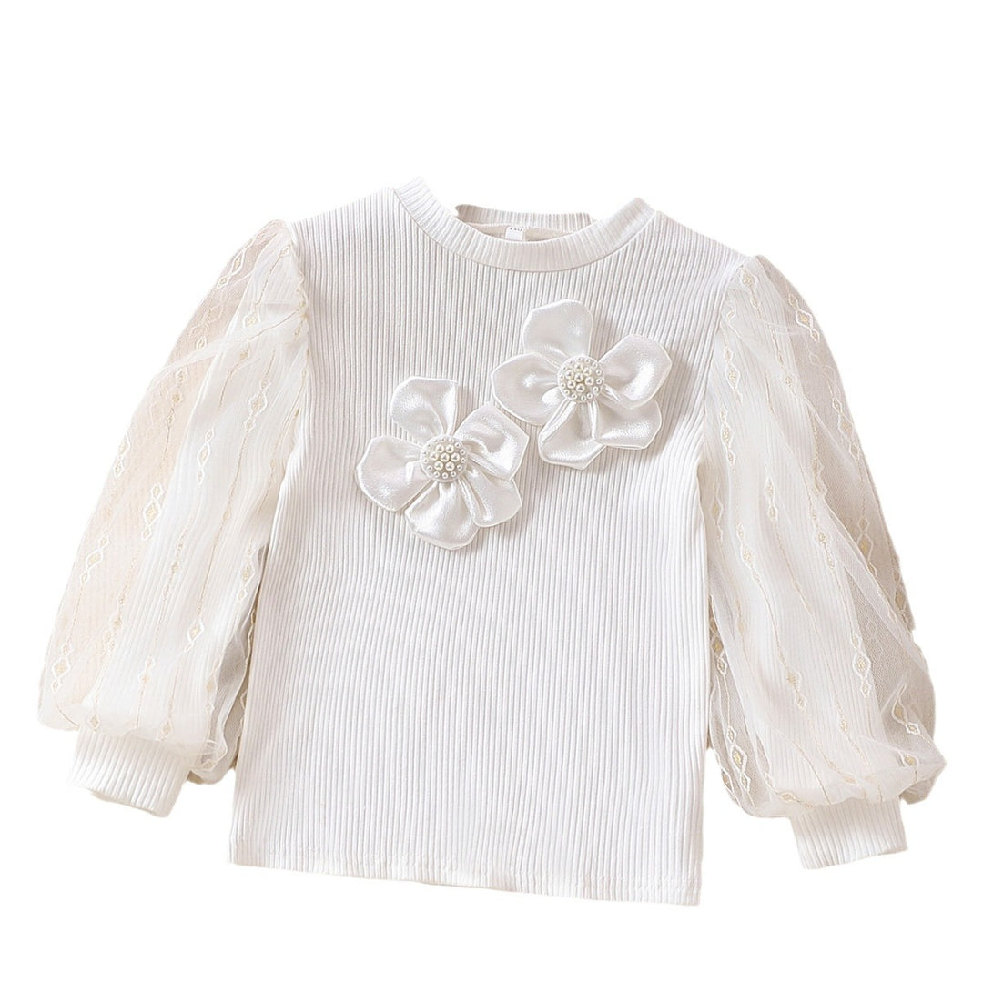 Mädchen modische Bluse mit transparenten Puffärmeln und floralen Akzenten Echo Archiv