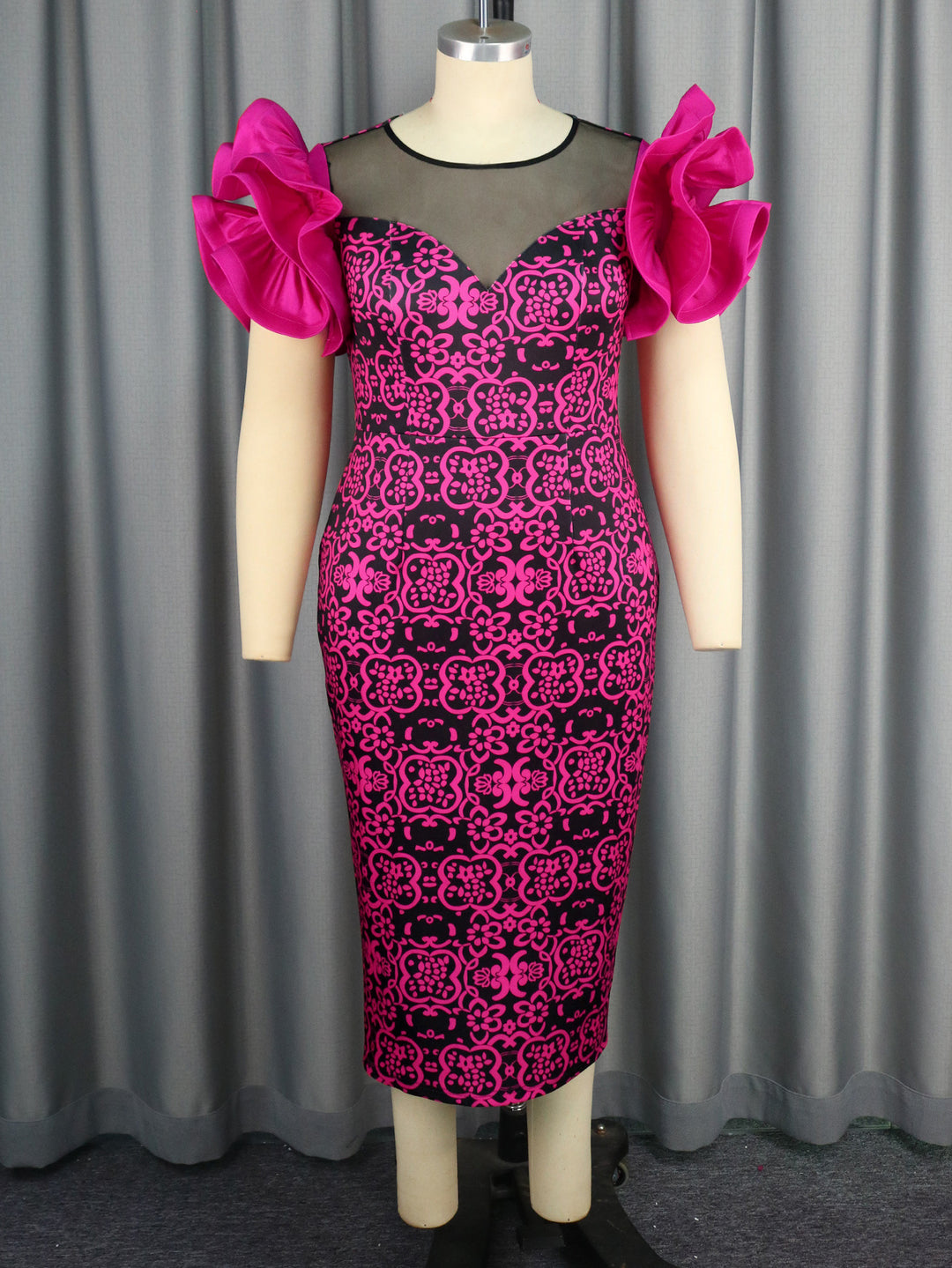 Damen Elegantes Etuikleid mit innovativen Puffärmeln und floralem Muster Echo Archiv