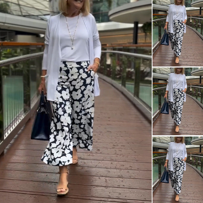 Damen nan weite Palazzohose mit großblumigem Print, hohem Bund und Eingrifftaschen Echo Archiv