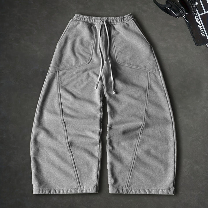 Damen Weite High‑Waist Baggy‑Jogginghose mit Tunnelzug, elastischem Bund und aufgesetzten Taschen Echoarchiv