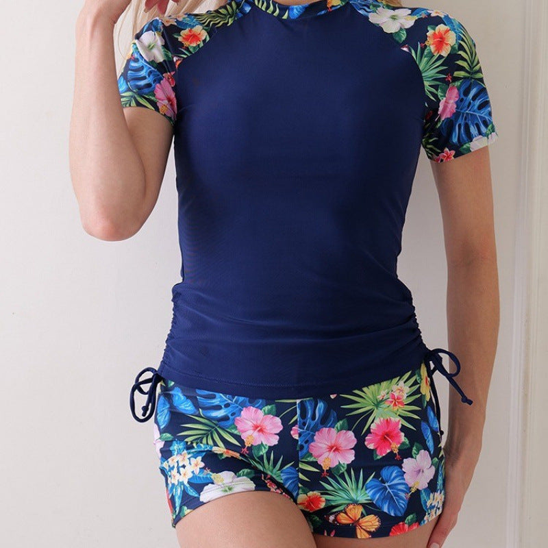 Damen Surf-Anzug mit floralem Design und modischen Akzenten Echo Archiv