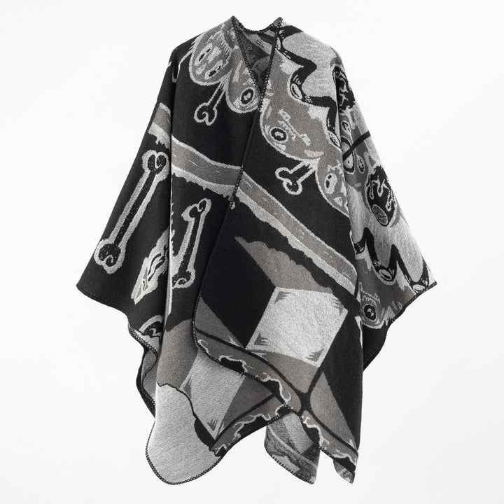 Damen Statement-Capeponcho aus jacquardgewebtem Wollmix mit Skull- und Knochenmuster Echo Archiv