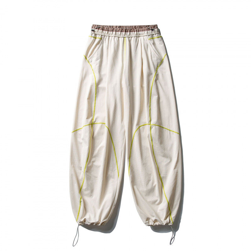 Unisex Locker geschnittene Tech-Jogginghose mit elastischem Bund, markanten Flatlock-Nähten und Kordelzug Echo Archiv