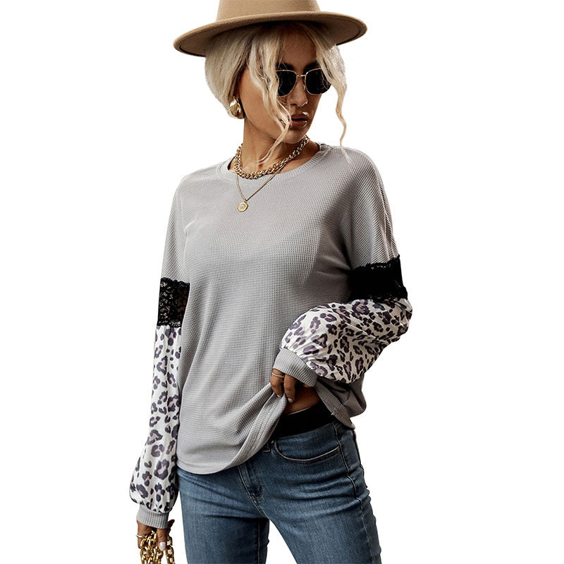 Damen Langarmshirt mit Leopardenärmeln und Spitzenbesatz Echoarchiv