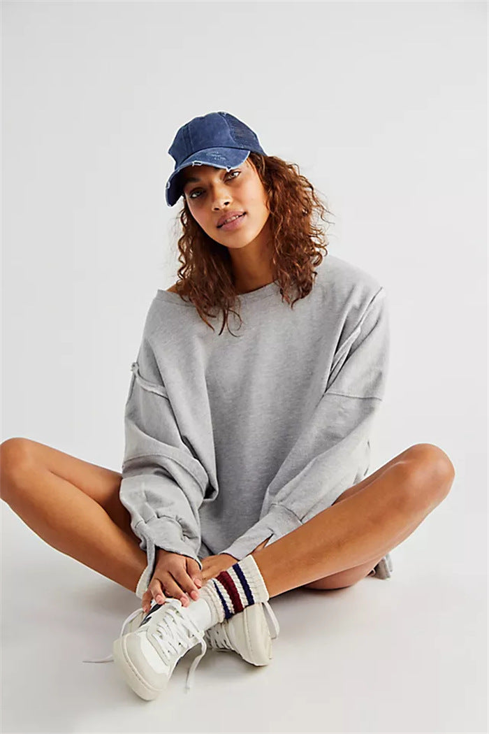 Damen oversized Sweatshirt mit Ballonärmeln, offenen Saumnähten und seitlichen Schlitzen – Avérine