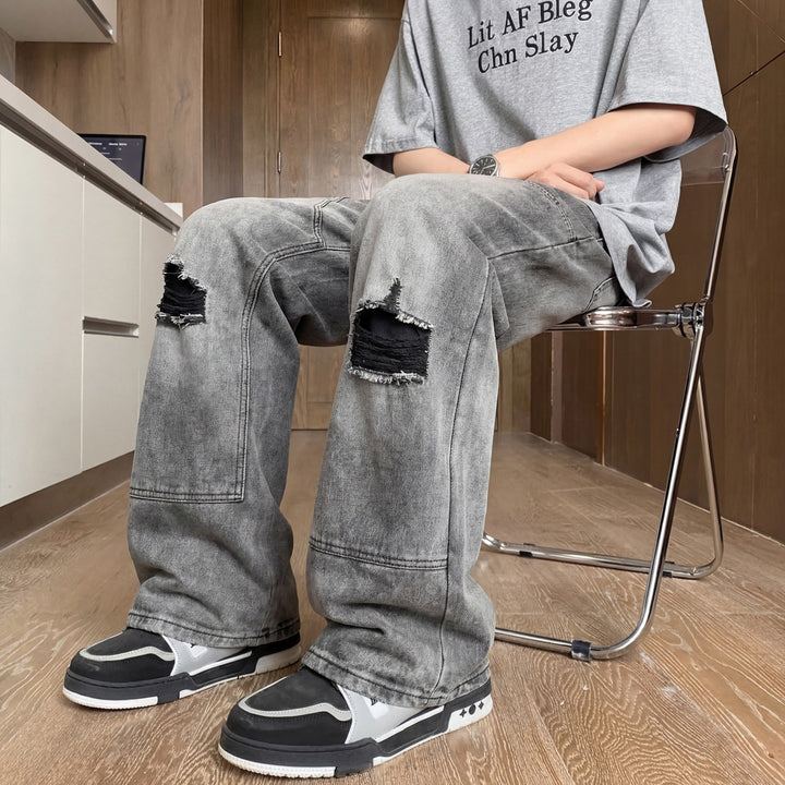 Herren Weite Baggy-Jeans mit Used‑Wash, Knie‑Rips & Utility‑Nähten Echoarchiv