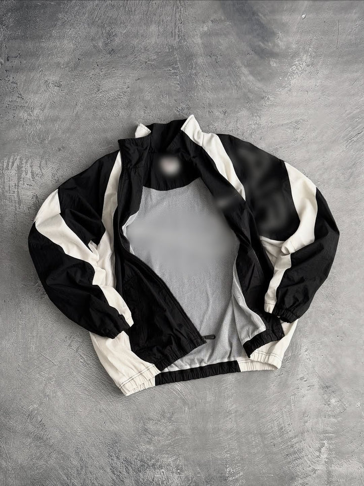 Unisex nan atmungsaktive leichte Wind- und Trainingsjacke mit Netzfutter, Stehkragen und elastischem Saum Echo Archiv