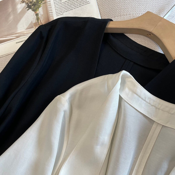 Damen Elegante Bluse mit strahlendem Knopfdetail Echoarchiv