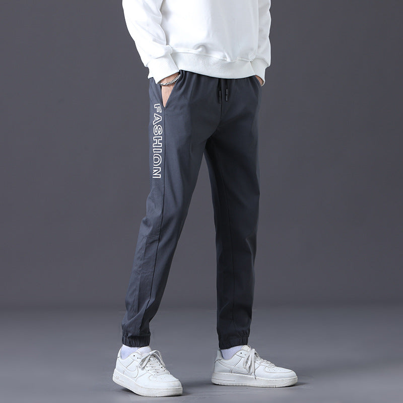 Herren modische Jogginghose mit elastischem Bund und seitlichen Taschen Echoarchiv