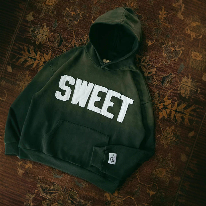 Unisex nan weit geschnittener Kapuzenpullover mit aufgesetzten Buchstabenapplikationen und Kängurutasche Echo Archiv