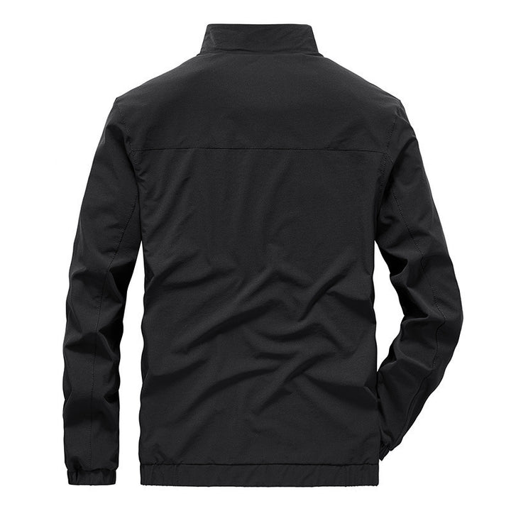 Herren Leichte Softshell-Windjacke mit Stehkragen wasserabweisenden Reißverschlüssen und Mesh-Innenfutter – Taviero