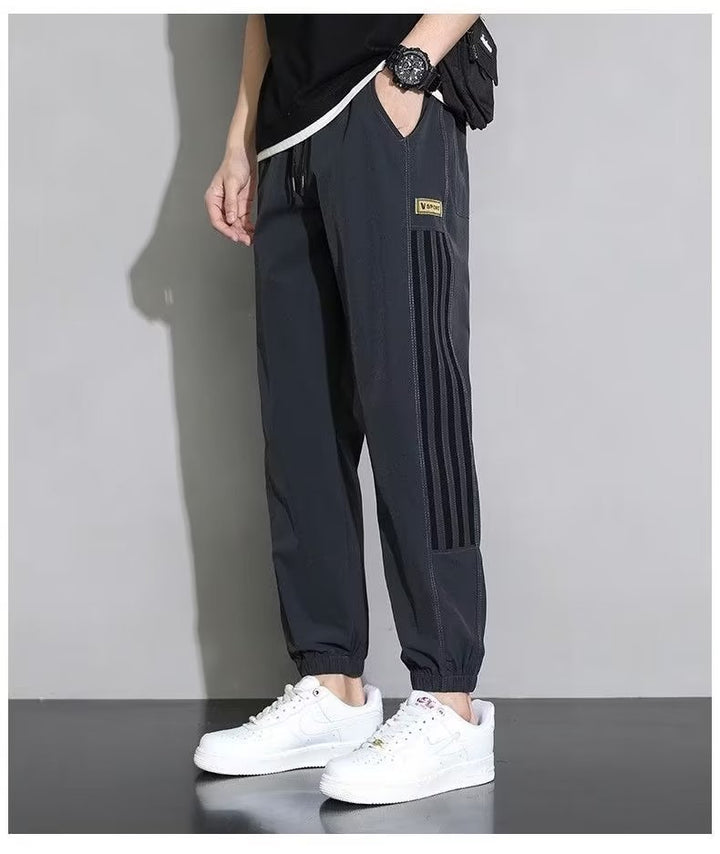 Damen Sportliche Trainingshose mit seitlichen Streifen Echoarchiv