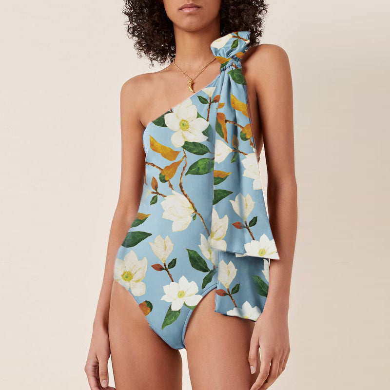 Damen Einseitiger Badeanzug mit floralem Design und elegantem Schleifen-Detail Echo Archiv