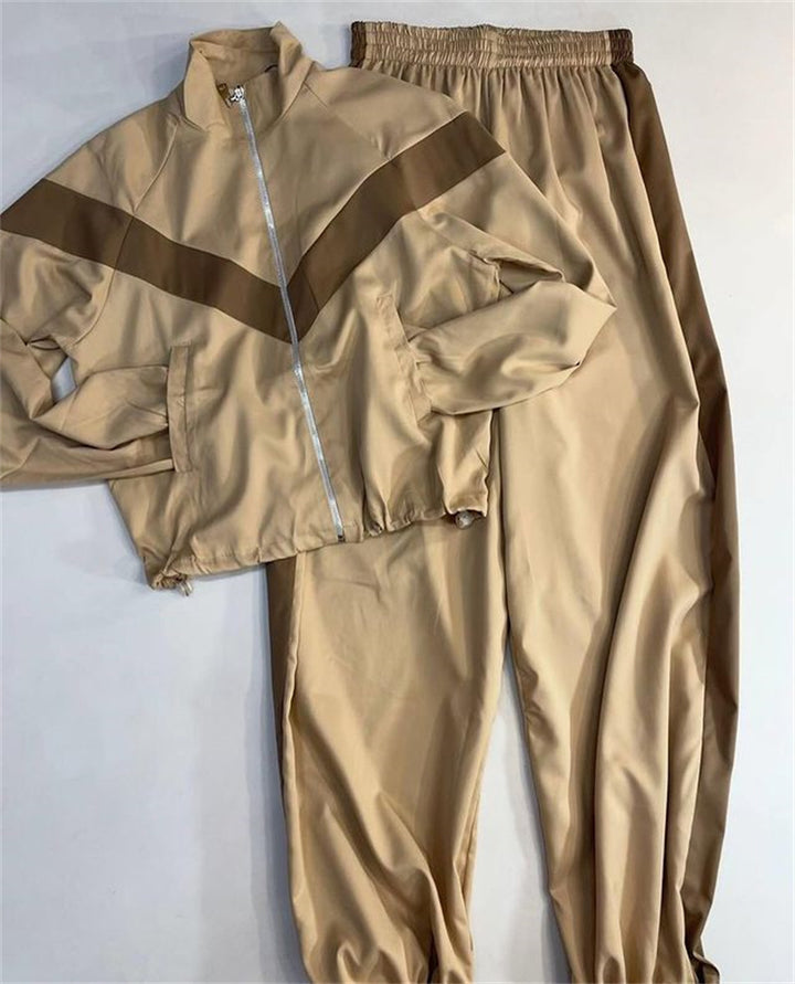 Damen tailliertes Zip-Trainingsset mit Chevron-Einsatz, Kordelzugsaum und hochgeschnittener Jogginghose – Avérine