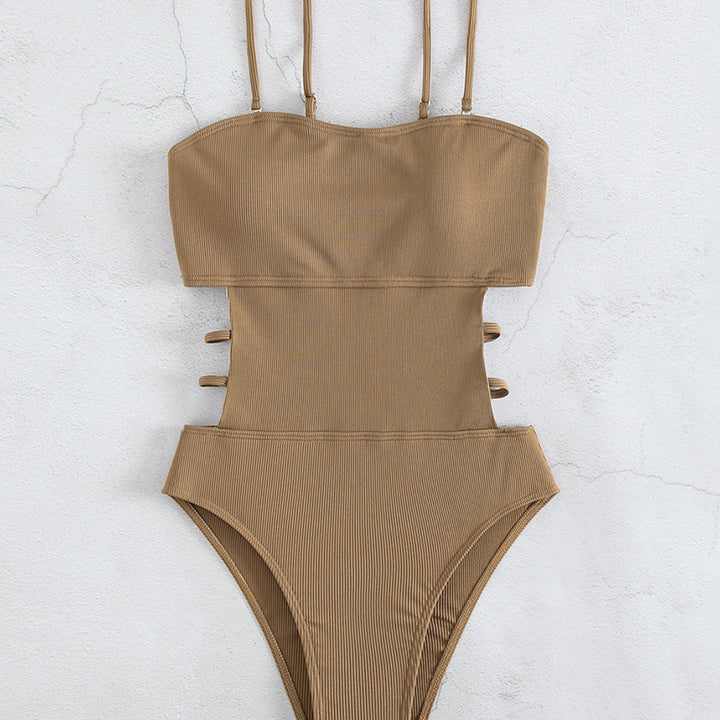 Damen Einteiler Badeanzug mit elegantem Schnitt und seitlichen Riemen Echo Archiv