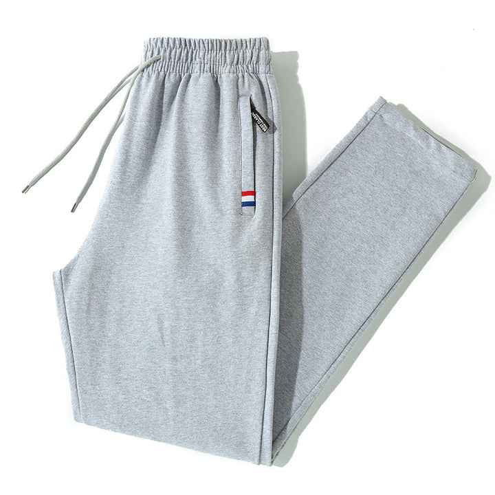 Herren Tapered-Jogginghose mit Tunnelzug, Reißverschlusstasche & Rippbündchen Echo Archiv