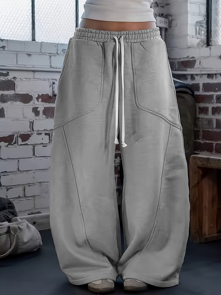 Damen Weite High‑Waist Baggy‑Jogginghose mit Tunnelzug, elastischem Bund und aufgesetzten Taschen Echoarchiv