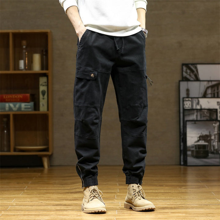 Herren Cargo-Joggerhose im Utility‑Stil mit ergonomischen Kniepaneelen und Reißverschluss‑Knöchel Echo Archiv
