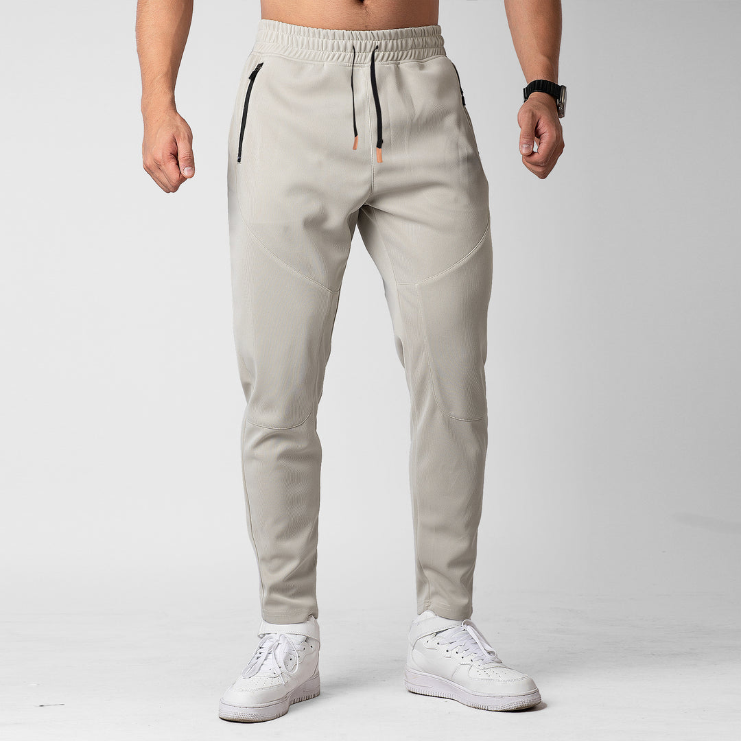 Herren Sportliche Jogginghose mit innovativer atmungsaktiver Struktur und praktischen Reißverschlusstaschen Echoarchiv