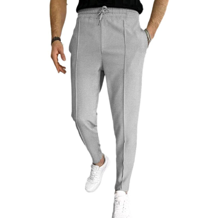 Herren nan strukturiertes Jogginghose mit elastischem Tunnelzug, formgebender Bügelfalte und tapered Bein Echo Archiv