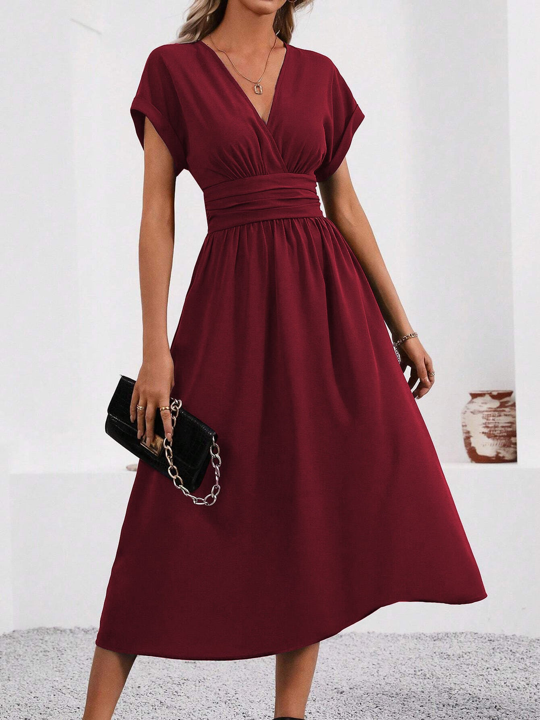Echoarchiv | Elegante Wickelkleid