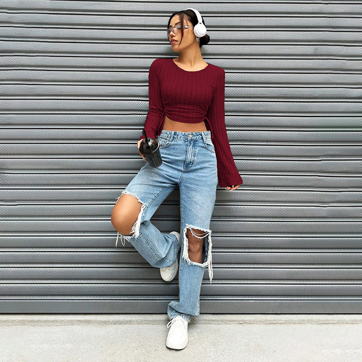 Damen geripptes Cropped-Longsleeve mit seitlicher Tunnelzugraffung, ausgestellten Ärmeln und figurbetonter Passform – Avérine