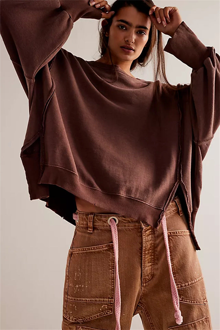 Damen oversized Sweatshirt mit Ballonärmeln, offenen Saumnähten und seitlichen Schlitzen – Avérine