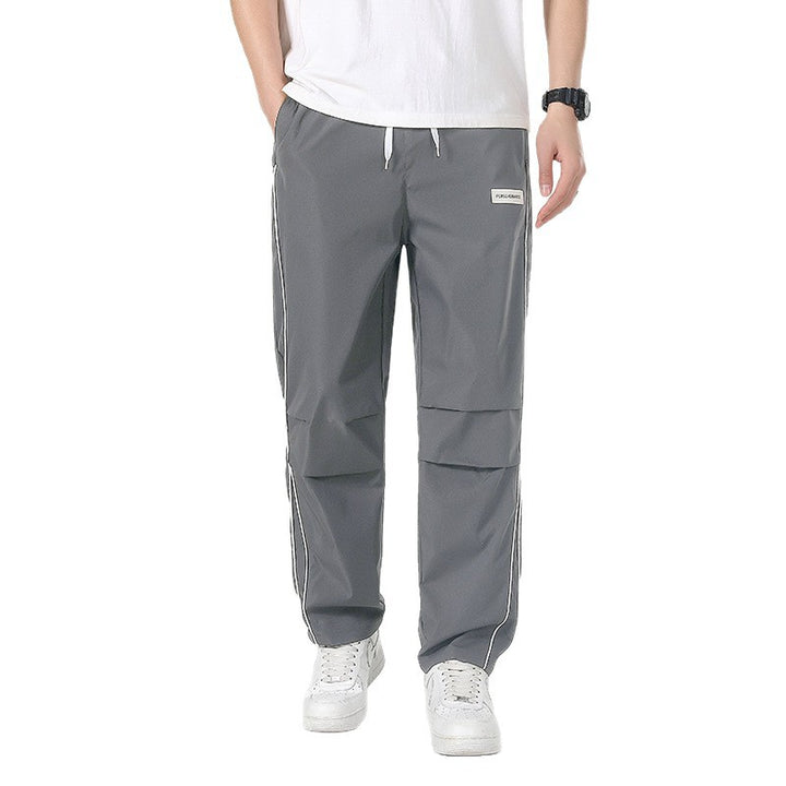 Herren Leichte Technical-Trackhose mit elastischem Bund, Knieabnähern & seitlicher Kontrastpaspel Echo Archiv