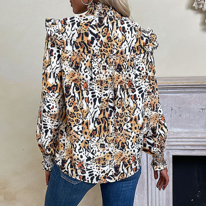 Damen Smocked-Bluse mit hohem Kragen, geraffter Schulterpasse und Animal-Print Echoarchiv