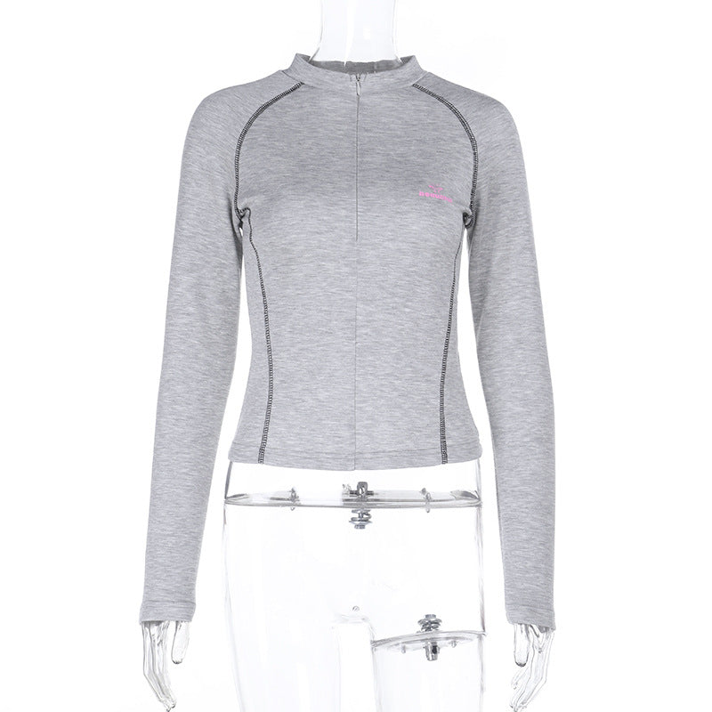 Damen Sportliches tailliertes Langarm-Performance-Shirt mit kurzem Frontreißverschluss – Avérine