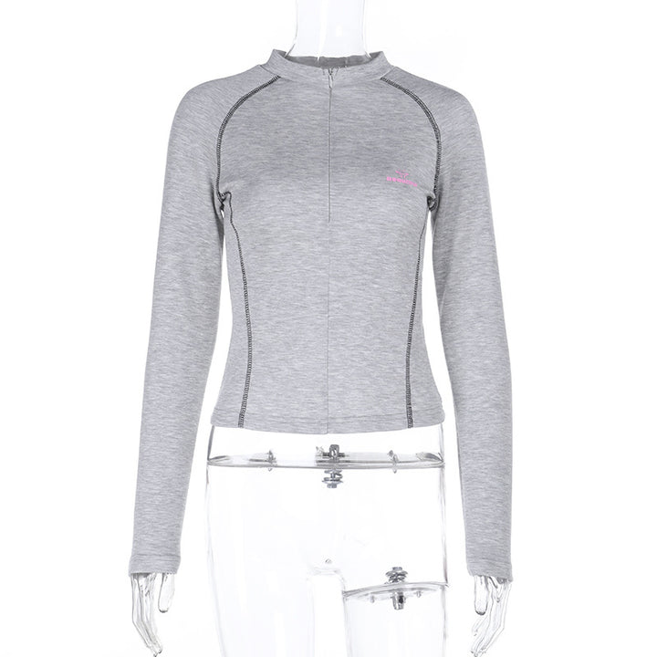 Damen Sportliches tailliertes Langarm-Performance-Shirt mit kurzem Frontreißverschluss – Avérine