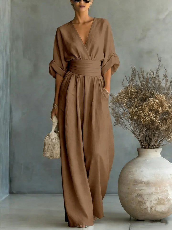 Echoarchiv | Eleganter Ärmelloser Jumpsuit mit Tiefem V-Ausschnitt, Taillenbund und Weitem Bein