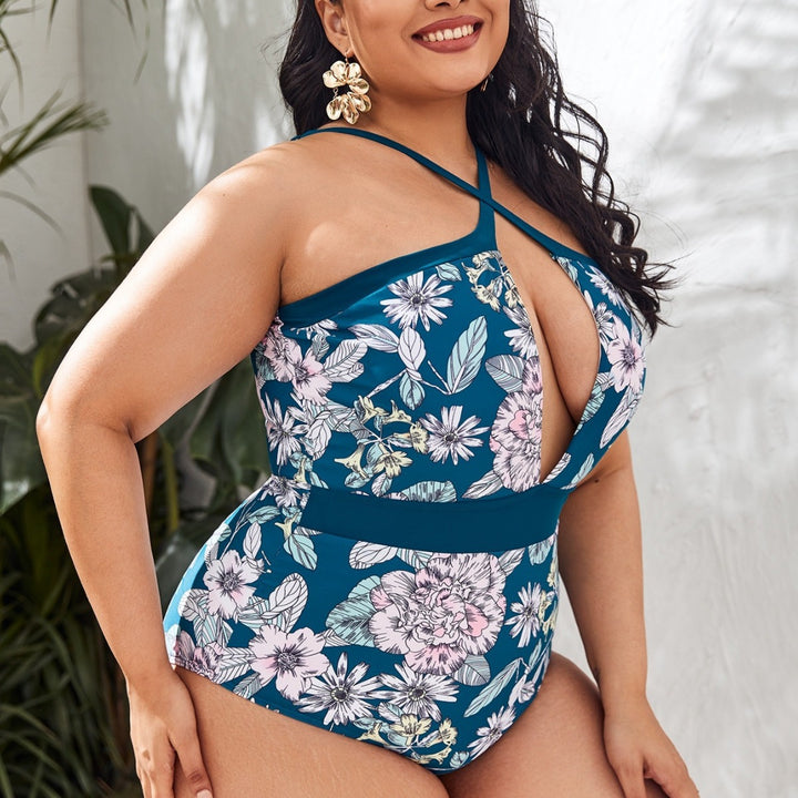 Damen Sportlicher Badeanzug mit tiefem V-Ausschnitt und floralem Design Echo Archiv